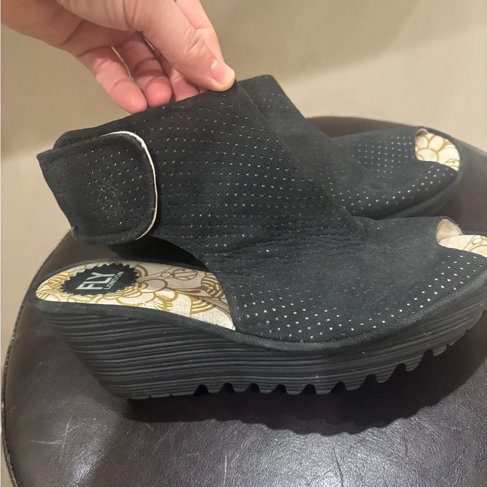 Fly London Black Wedge Shoes with Perforated Design